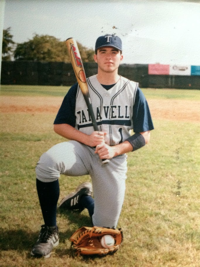 Logan in his high-school baseball uniform